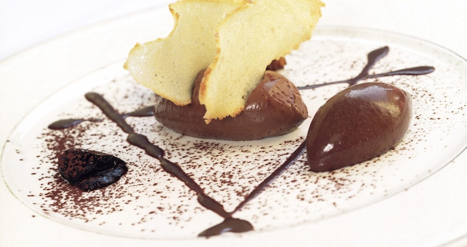 Professional chefs serving fine dining food