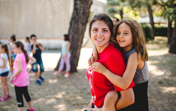 A Camp Counselor with one of the Italian participants